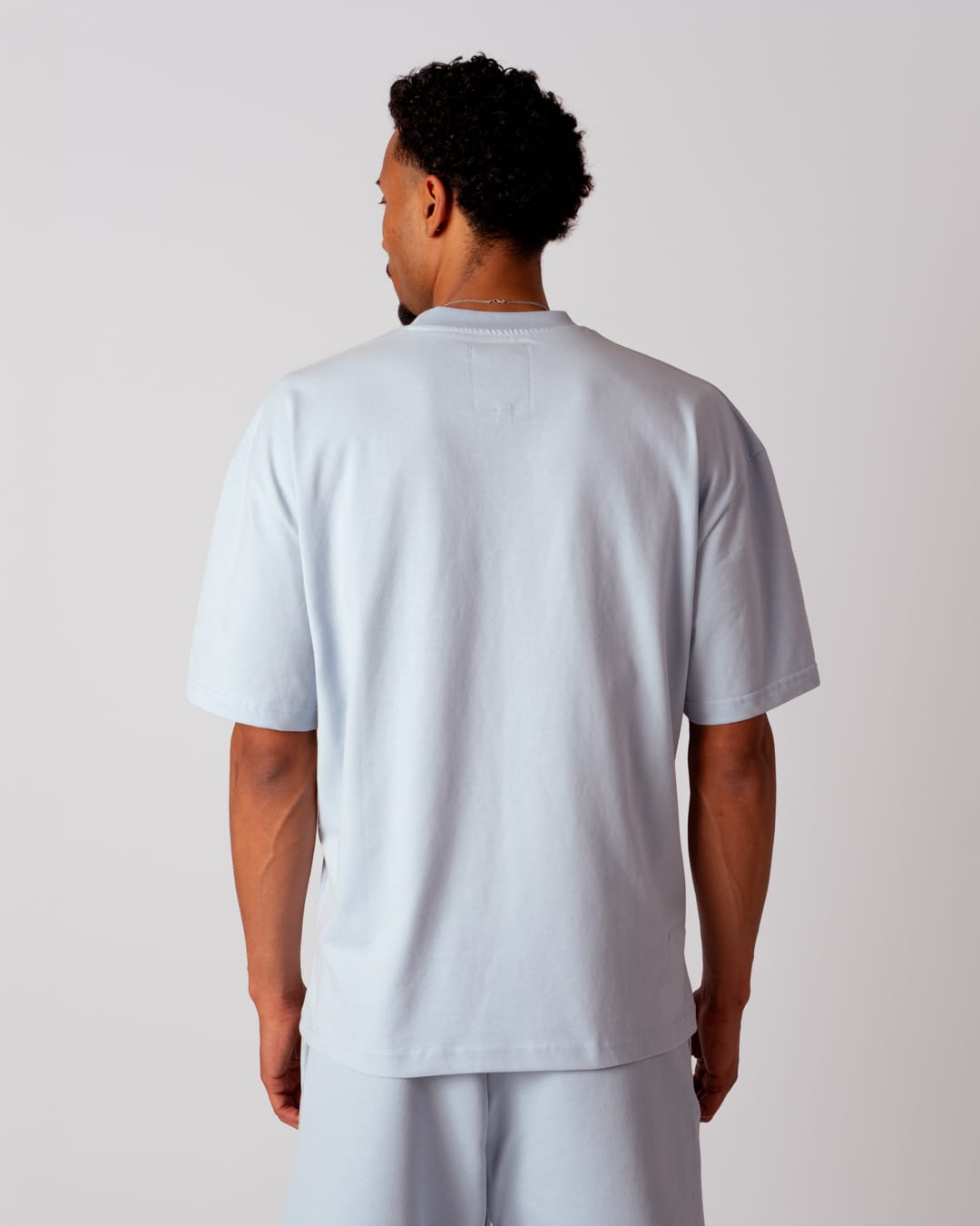 OVERSIZE T-SHIRT “IN PEACE WE TRUST” Light Blue