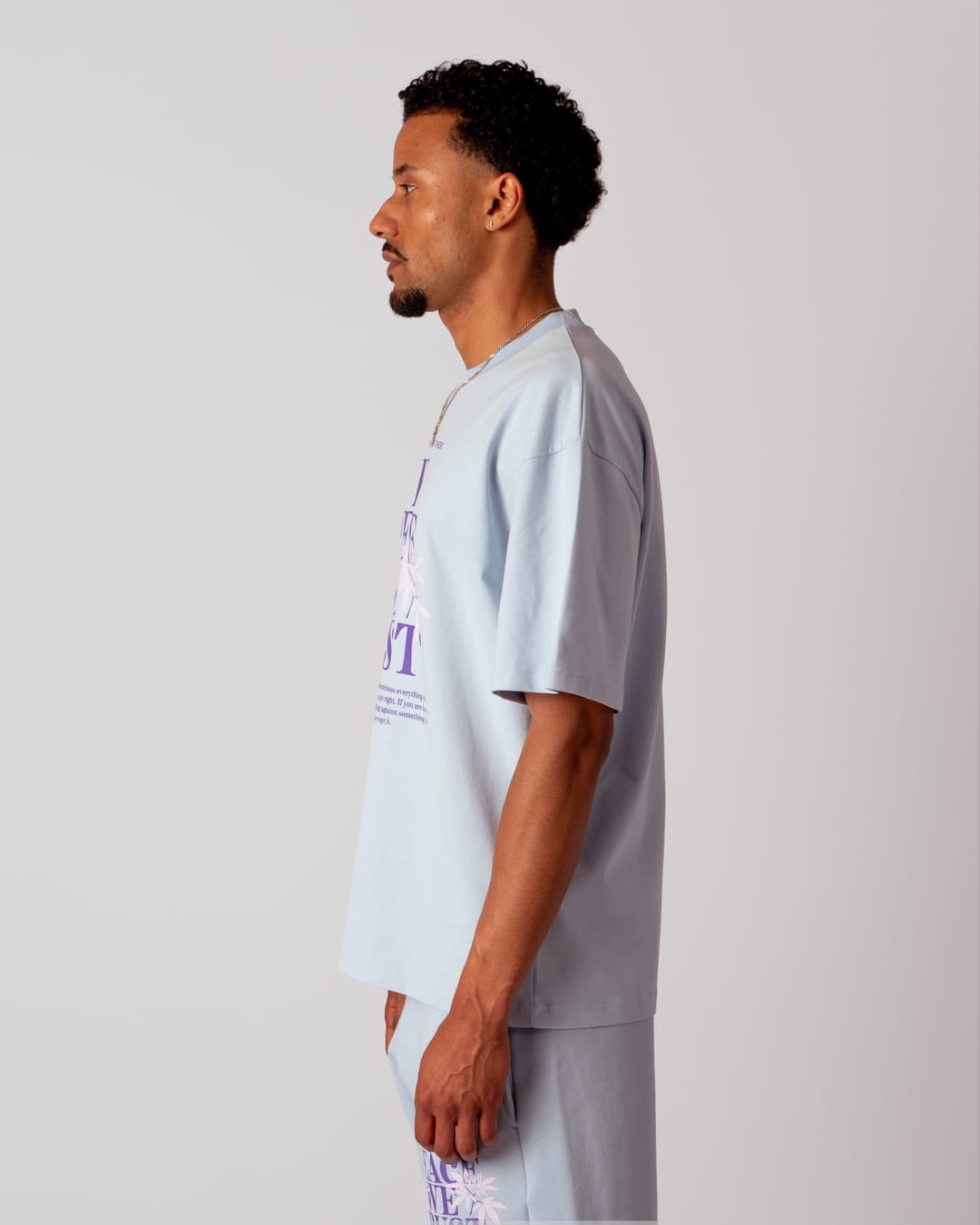 OVERSIZE T-SHIRT “IN PEACE WE TRUST” Light Blue